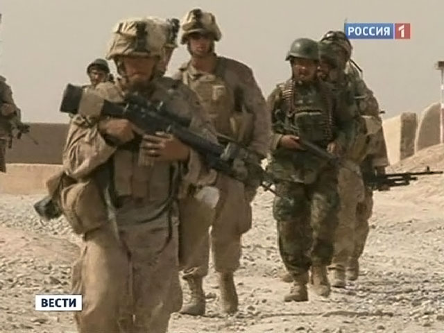 Фотоскандал в США: подлинность жестоких снимков не установлена